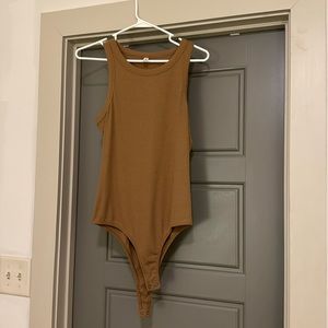 brown body suit